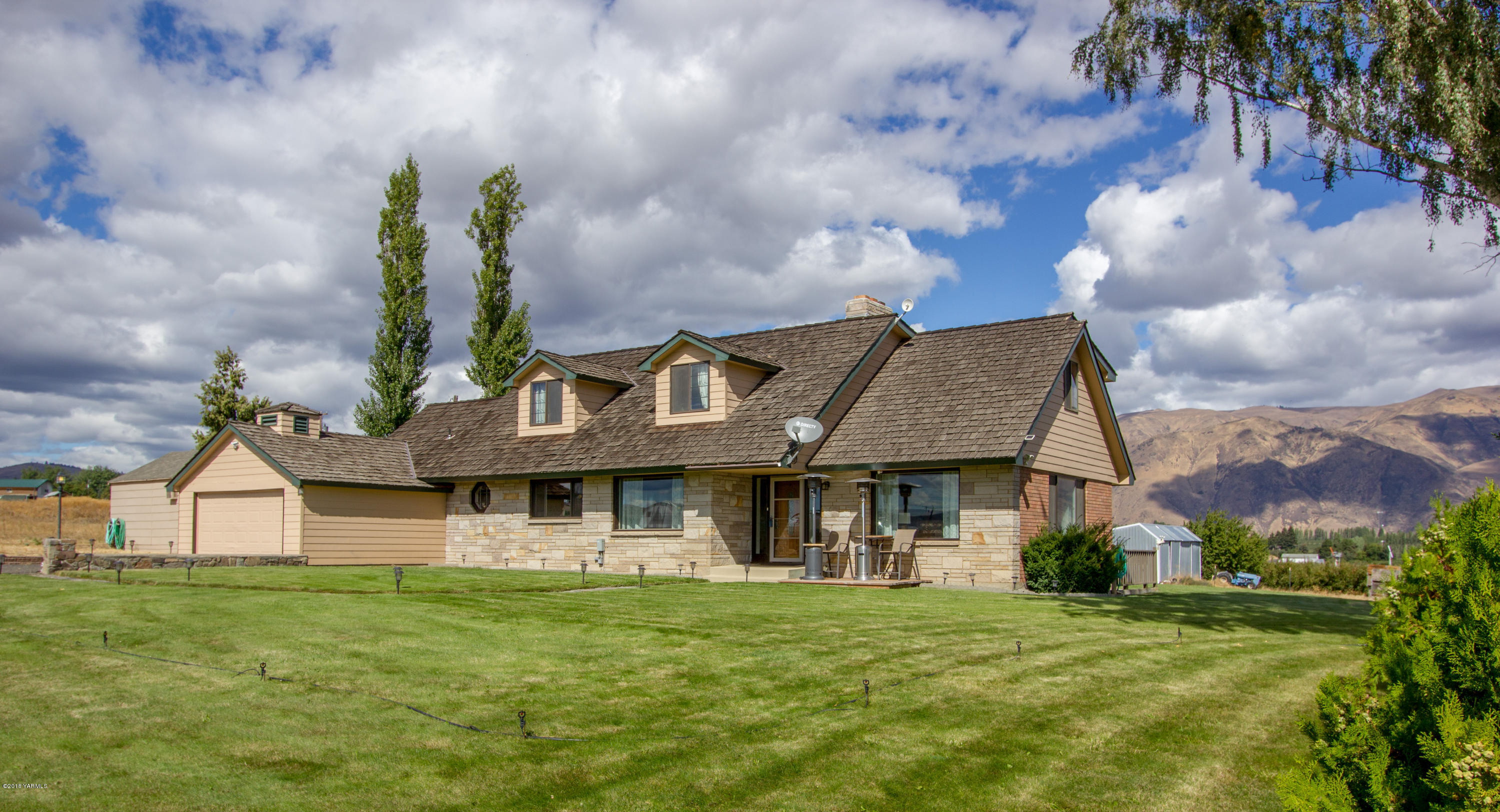 491 Section 1 Road Tieton, WA 98947 - Photo 6 of 23 a front view of a house with garden