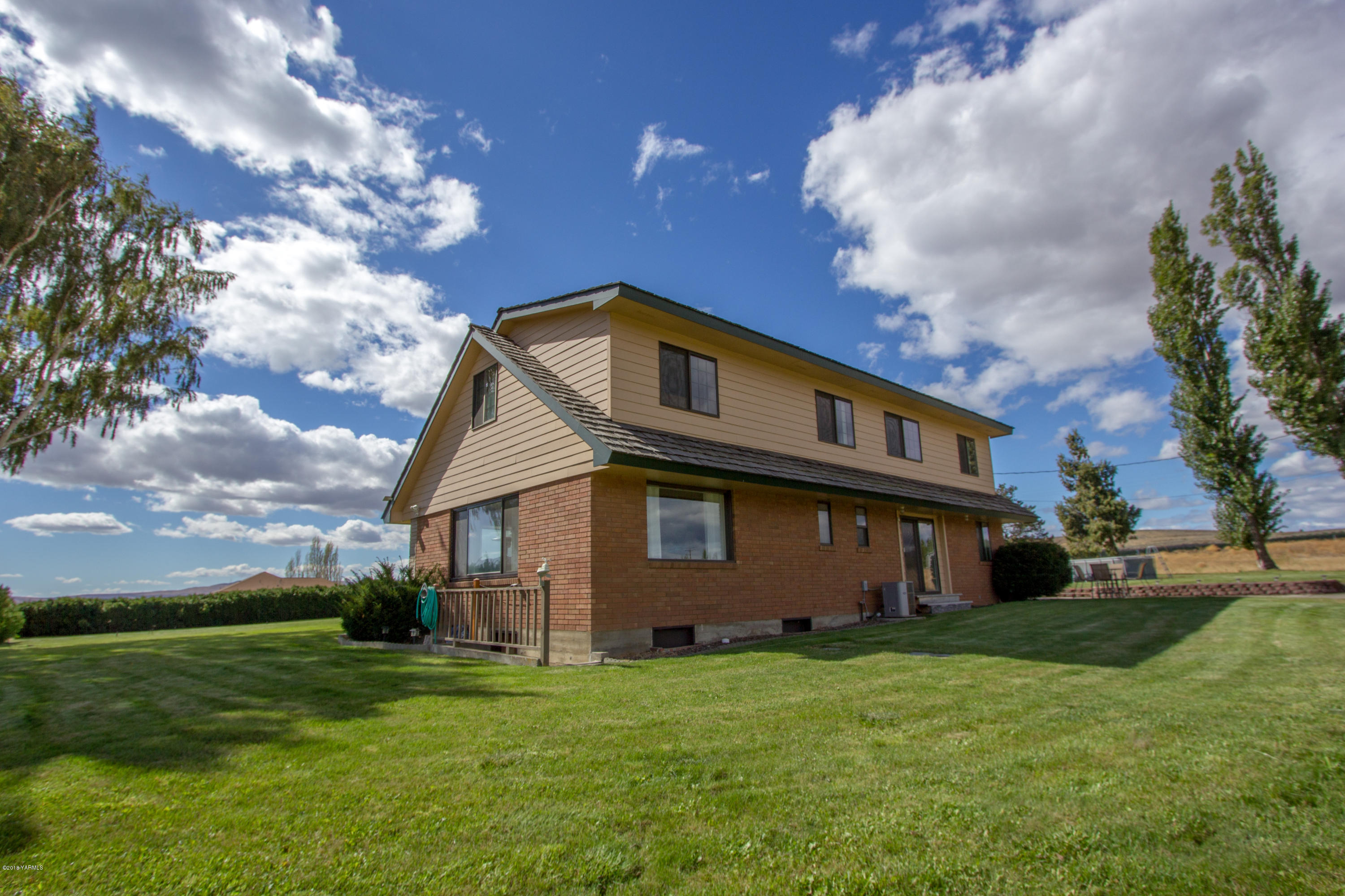 491 Section 1 Road Tieton, WA 98947 - Photo 7 of 23 a front view of a house with garden