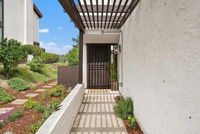 a view of balcony with wooden floor