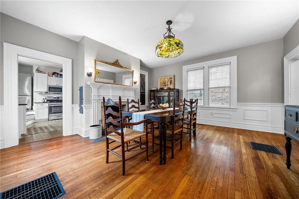 755 South Main Street Washington, PA 15301 - Photo 11 of 44 a view of a dining room with furniture and wooden floor
