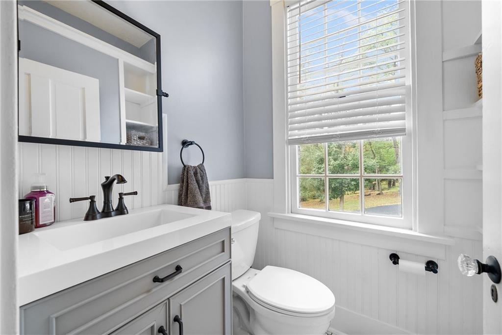 755 South Main Street Washington, PA 15301 - Photo 19 of 44 a bathroom with a sink a toilet and a window