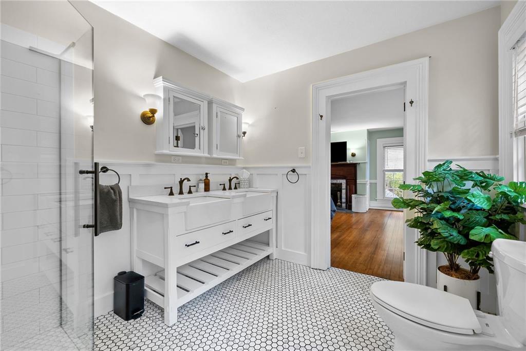 755 South Main Street Washington, PA 15301 - Photo 29 of 44 a spacious en suite bathroom with a potted plant and a sink
