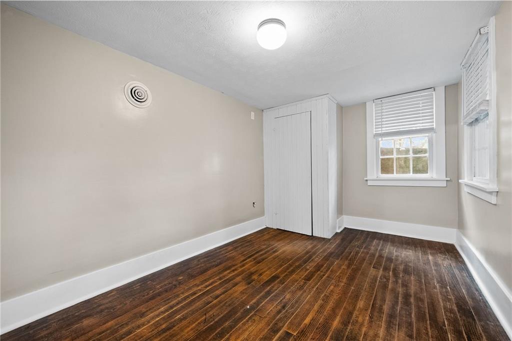 755 South Main Street Washington, PA 15301 - Photo 42 of 44 an empty room with wooden floor and windows