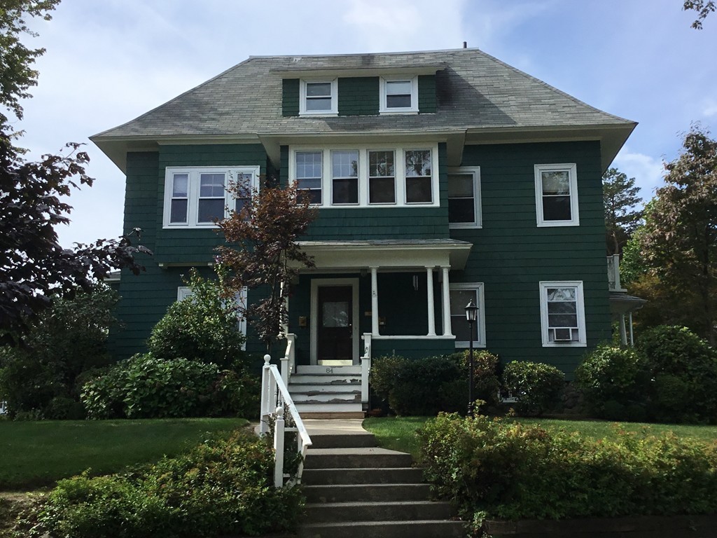 53 Brighton Road Worcester, MA 01606 - Photo 2 of 22 a front view of a house with a yard
