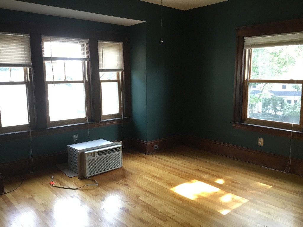 53 Brighton Road Worcester, MA 01606 - Photo 5 of 22 a view of an empty room with a window