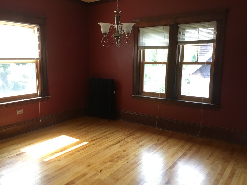 53 Brighton Road Worcester, MA 01606 - Photo 8 of 22 an empty room with windows