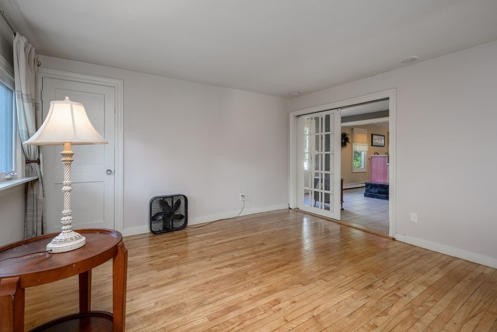 34 Clapp Street Abington, MA 02351 - Photo 12 of 21 a view of a room with wooden floor table and chair