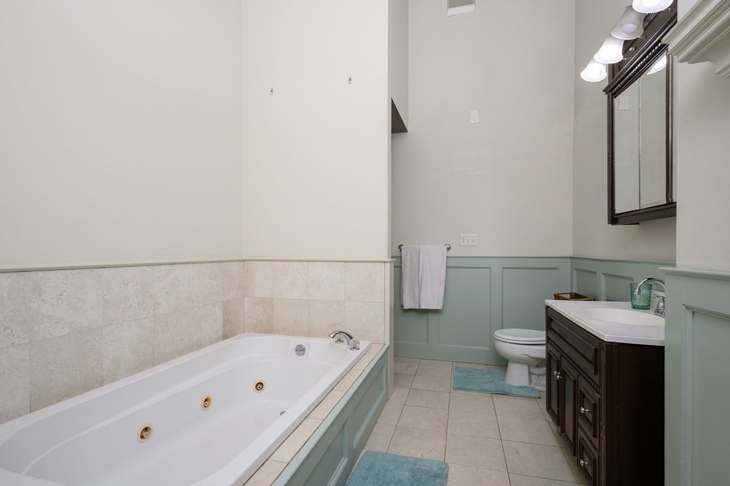 34 Clapp Street Abington, MA 02351 - Photo 17 of 21 a bathroom with a tub a sink and a toilet