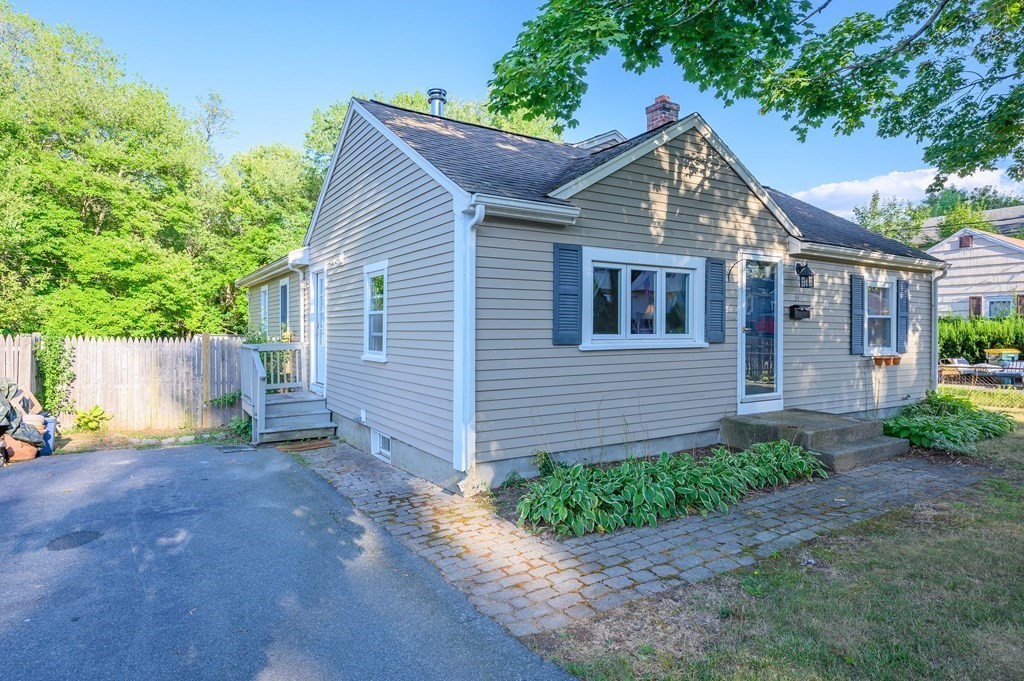34 Clapp Street Abington, MA 02351 - Photo 2 of 21 a view of a house with a yard and plants