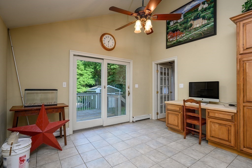 34 Clapp Street Abington, MA 02351 - Photo 8 of 21 a view of a livingroom with workspace and a window
