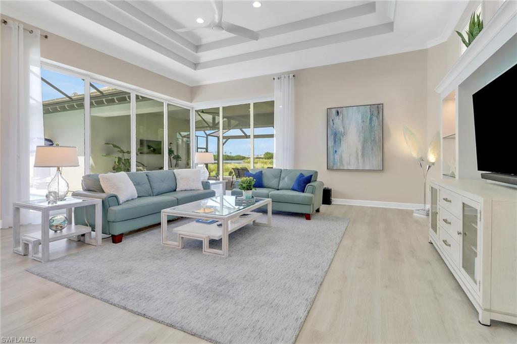 6257 Negril Isle Drive Naples, FL 34113 - Photo 13 of 47 Zero corner pocket sliders off living room