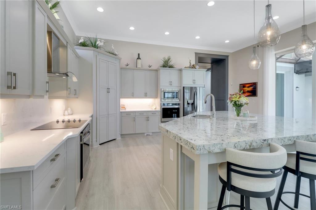 6257 Negril Isle Drive Naples, FL 34113 - Photo 9 of 47 Kitchen
