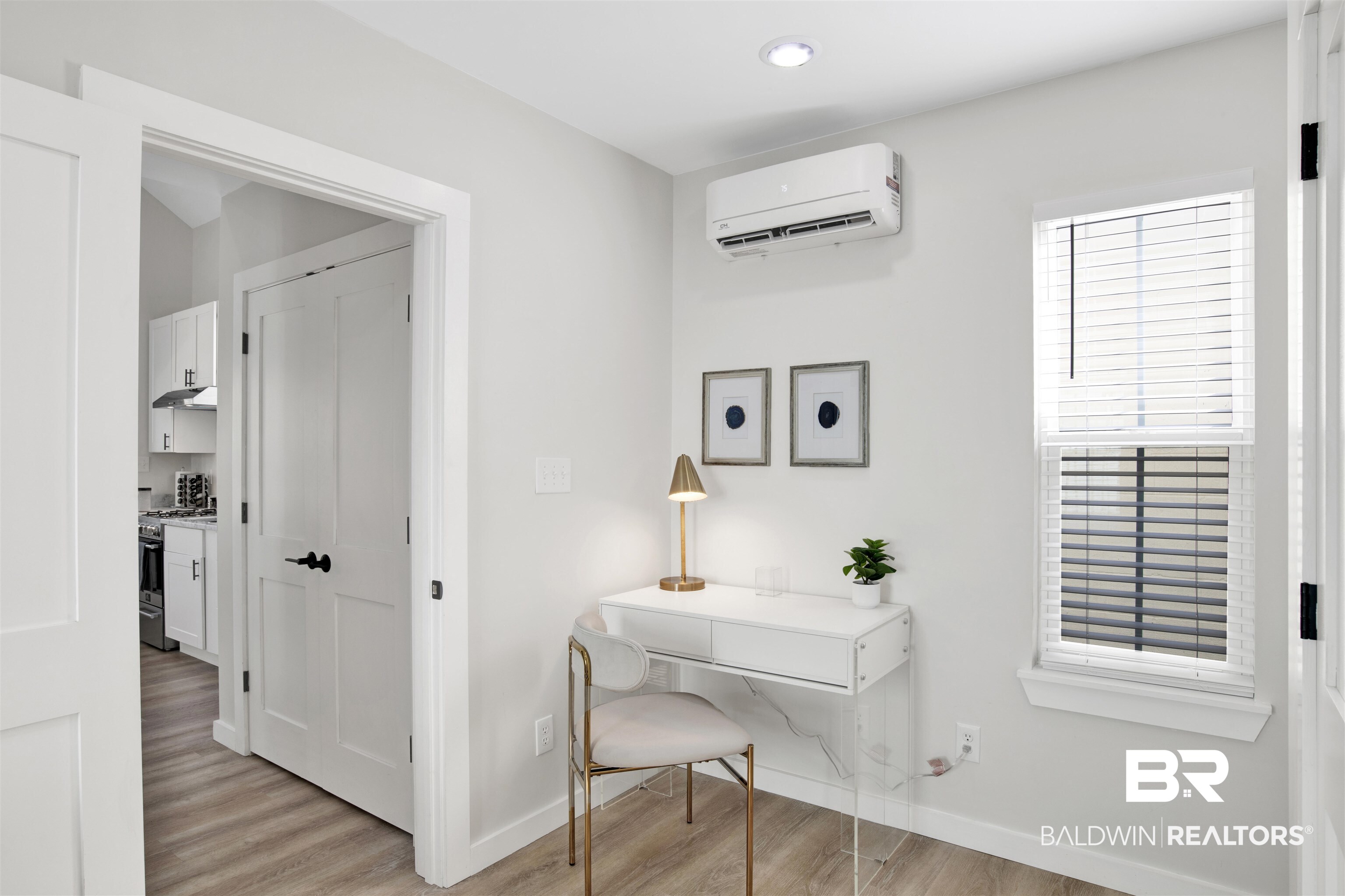 551 Congress Street Mobile, AL 36603 - Photo 18 of 19 Home office with light wood finished floors and a wall mounted mini split