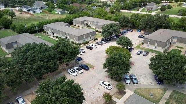 an aerial view of residential house with outdoor space