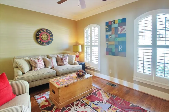 a living room with a couch and a window