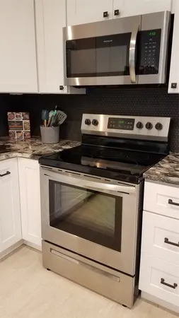 a bedroom with bed and walk in closet