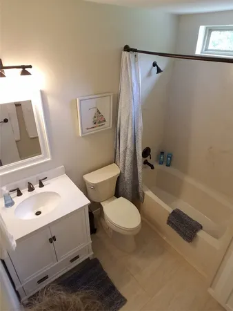 a bathroom with a sink and a shower