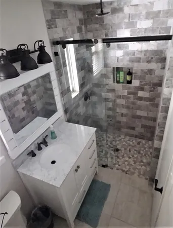 a close view of stove top oven and cabinets