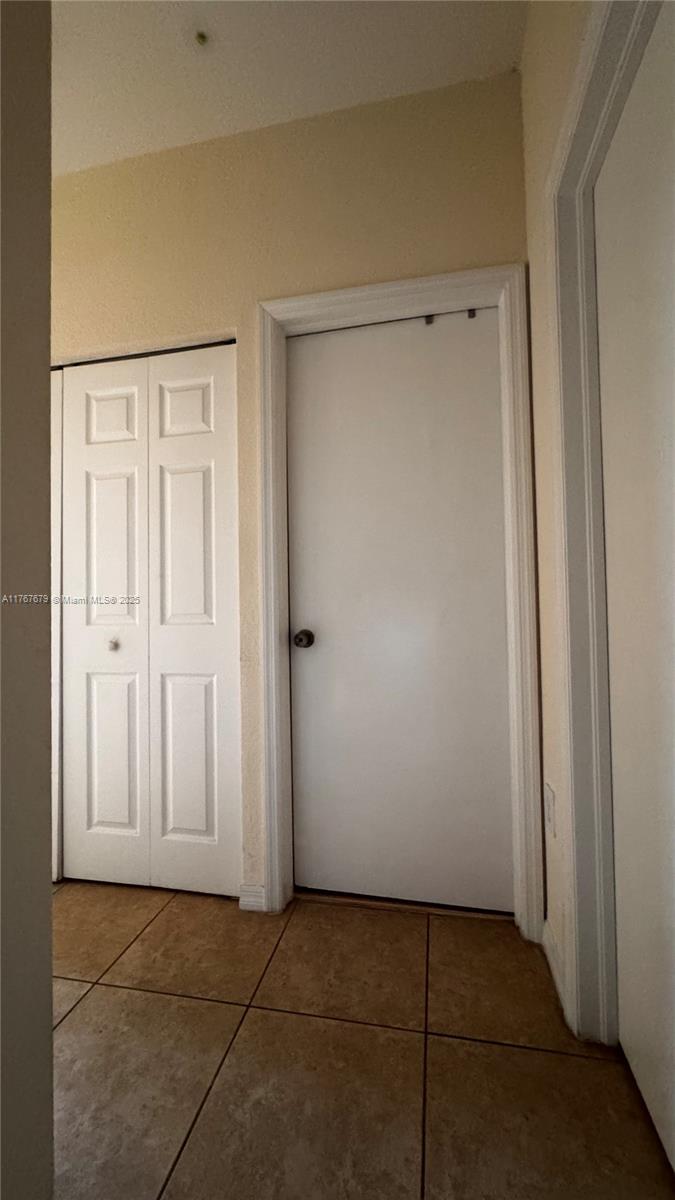 1033 Southwest 144th Avenue, Unit 2705 Pembroke Pines, FL 33027 - Photo 17 of 28 a view of an empty room