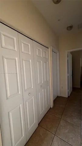 a bathroom with a sink a mirror and a bathtub