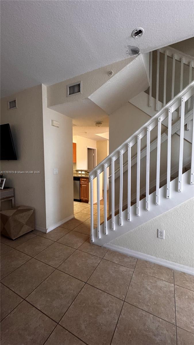 1033 Southwest 144th Avenue, Unit 2705 Pembroke Pines, FL 33027 - Photo 6 of 28 a view of a livingroom with entryway