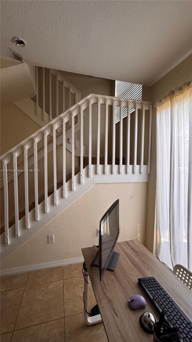 1033 Southwest 144th Avenue, Unit 2705 Pembroke Pines, FL 33027 - Photo 7 of 28 a view of a room with stair