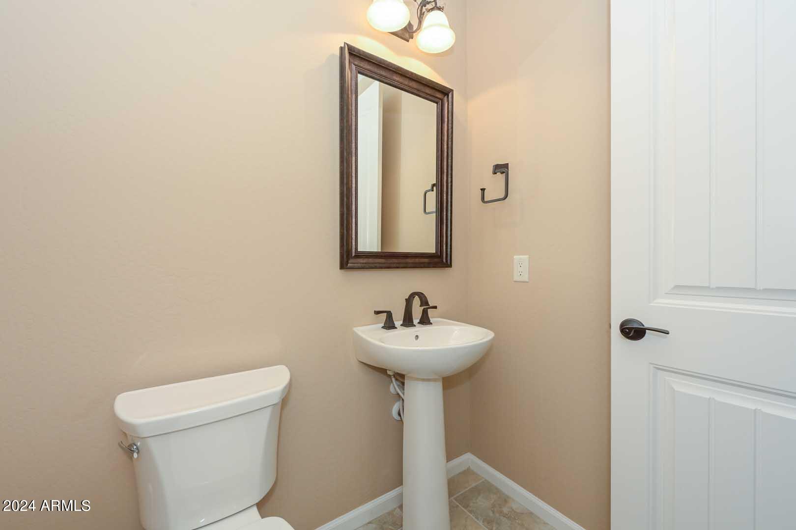 16760 West Berkeley Road Goodyear, AZ 85395 - Photo 18 of 49 Powder Room
