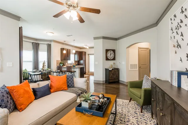 a view of a dining room with furniture and window