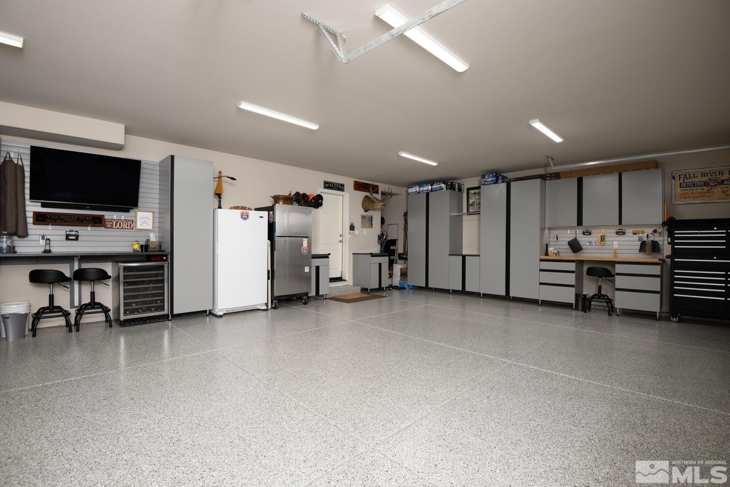 Undisclosed Address Minden, NV 89423 - Photo 12 of 33 a view of a livingroom with gym equipment