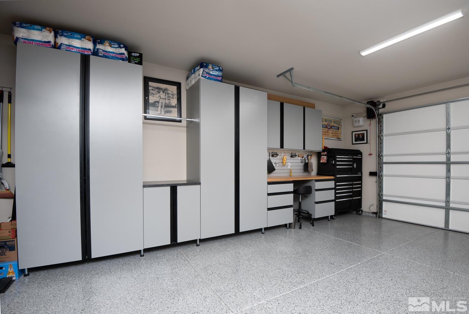 Undisclosed Address Minden, NV 89423 - Photo 13 of 33 a kitchen with refrigerator and cabinets