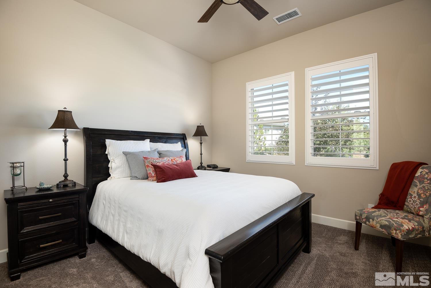 Undisclosed Address Minden, NV 89423 - Photo 20 of 33 a bedroom with a bed and a couch