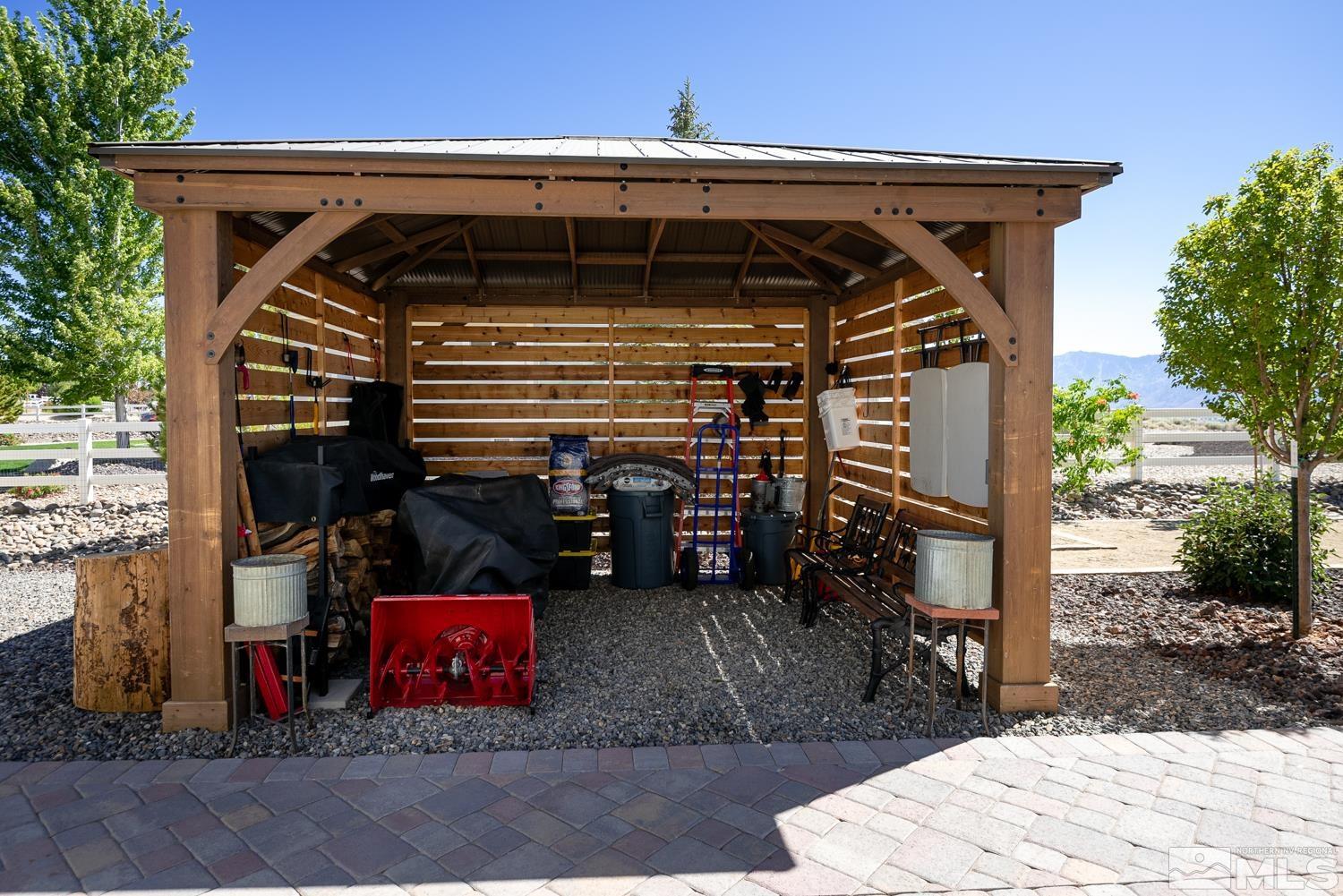 Undisclosed Address Minden, NV 89423 - Photo 29 of 33 a view of a car park in front of garage