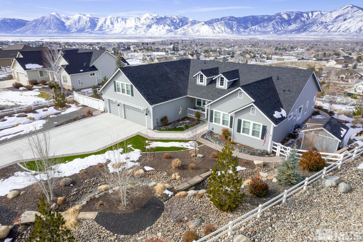 Undisclosed Address Minden, NV 89423 - Photo 3 of 33 an aerial view of a house with a yard