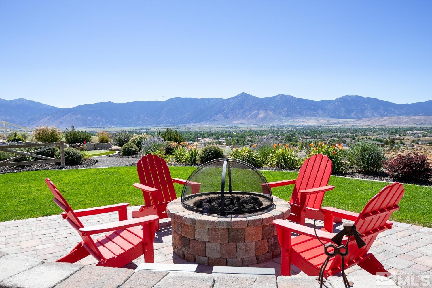 Undisclosed Address Minden, NV 89423 - Photo 31 of 33 a view of an outdoor sitting area with a garden