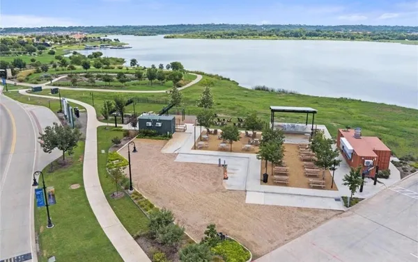 an aerial view of a house with a lake view