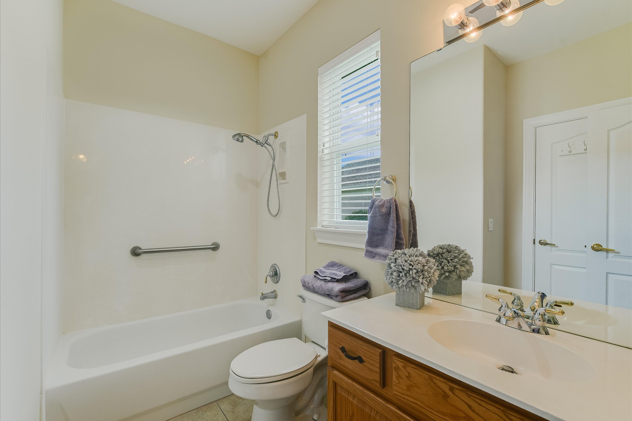 603 Rio Grande Loop Georgetown, TX 78633 - Photo 21 of 27 Full bath featuring shower / tub combination, vanity, and light tile patterned flooring