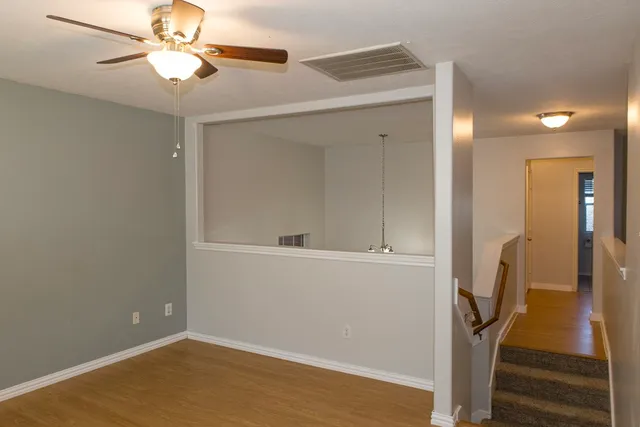 a view of entryway with wooden floor