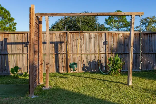 a view of a backyard with a garden