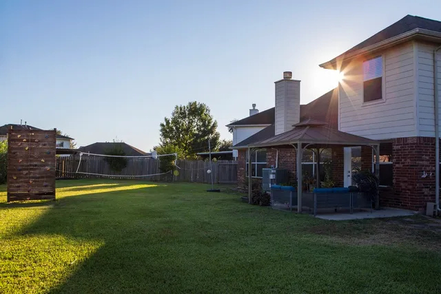 a view of a house with a swimming pool