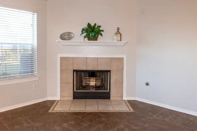 a living room with a fireplace