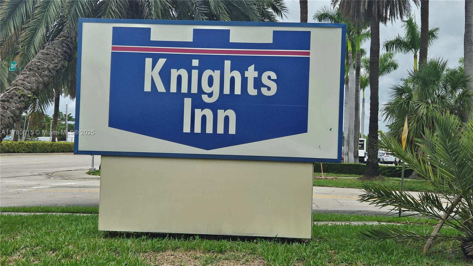 26 Diplomat Parkway, Unit 2259 Hallandale Beach, FL 33009 - Photo 2 of 10 a sign that is on a brick wall