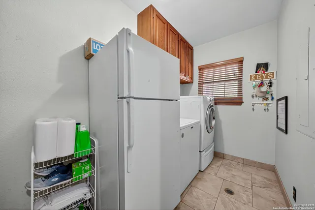 a view of hallway with washer and dryer