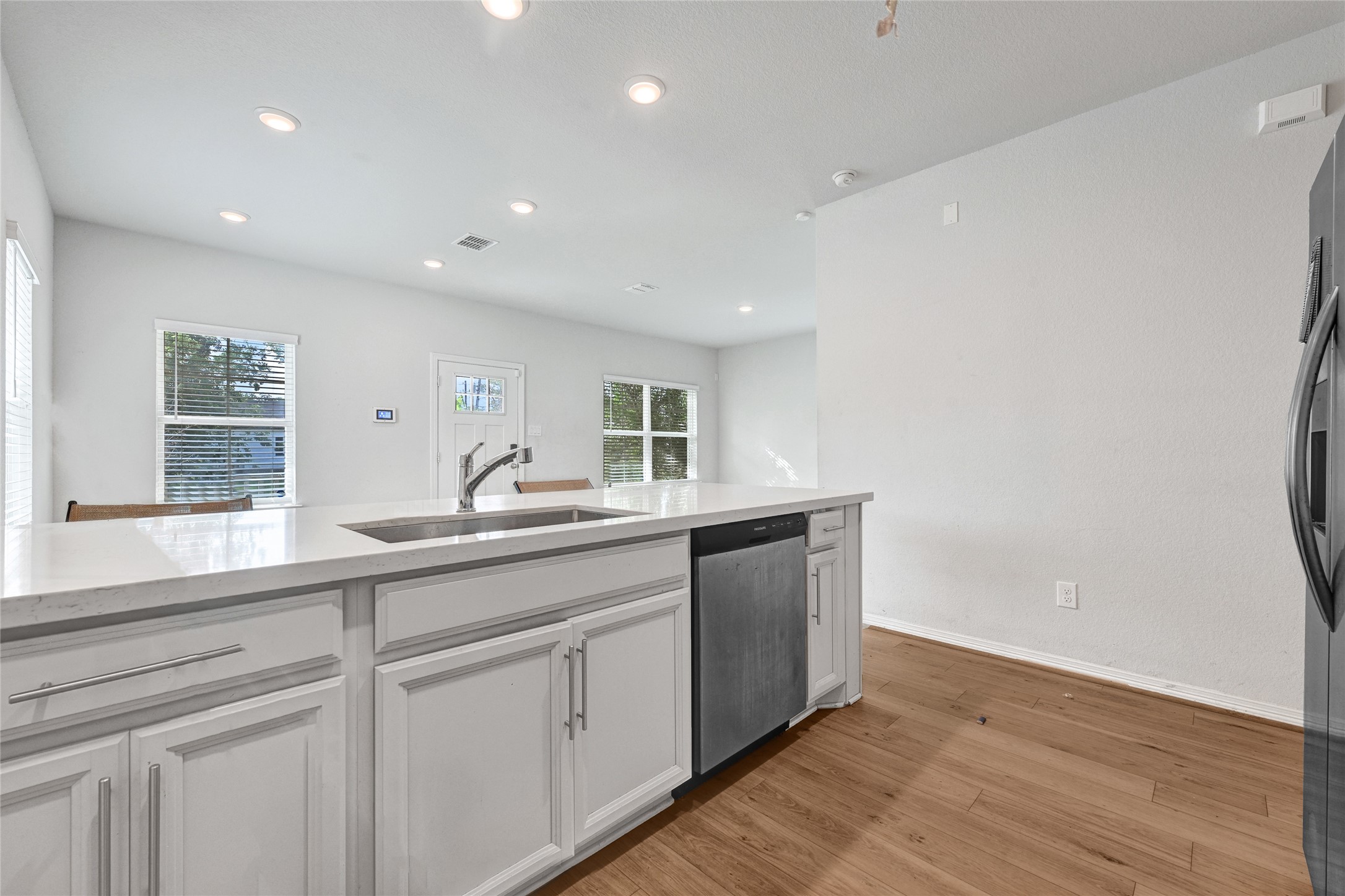 6320 Paris Street Houston, TX 77021 - Photo 6 of 16 a kitchen with white cabinets and sink