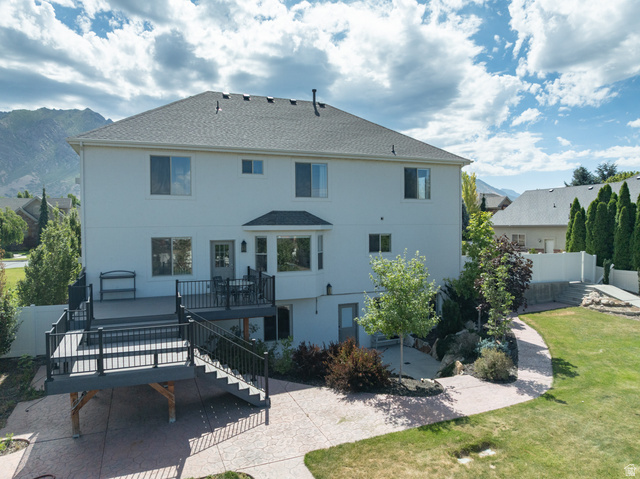 868 Braddock Lane Alpine, UT 84004 - Photo 64 of 64 Multi-level deck with black railings and stairs, providing outdoor living space