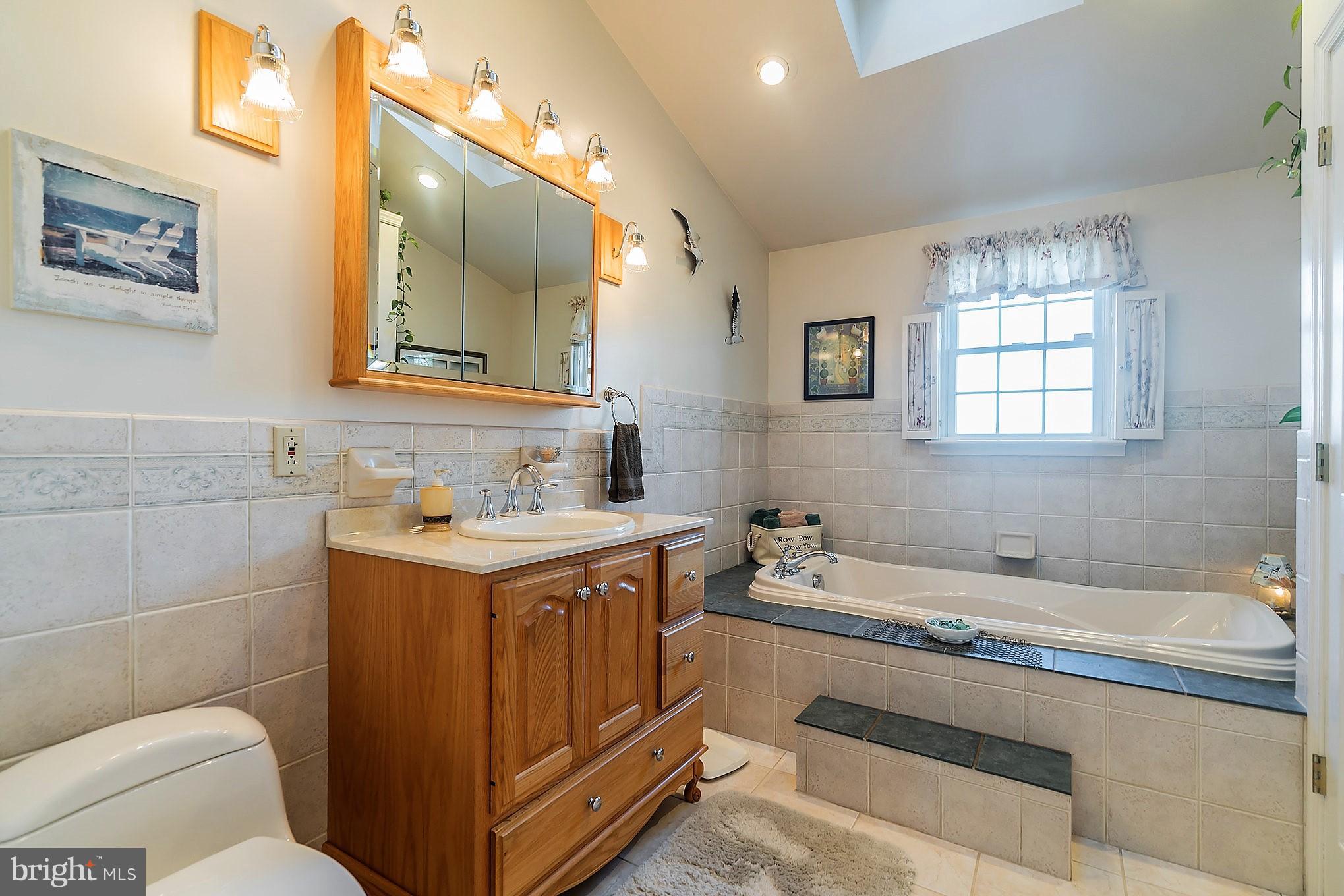 1958 Poplar Ridge Road Pasadena, MD 21122 - Photo 18 of 30 Skylight and relaxing whirlpool tub