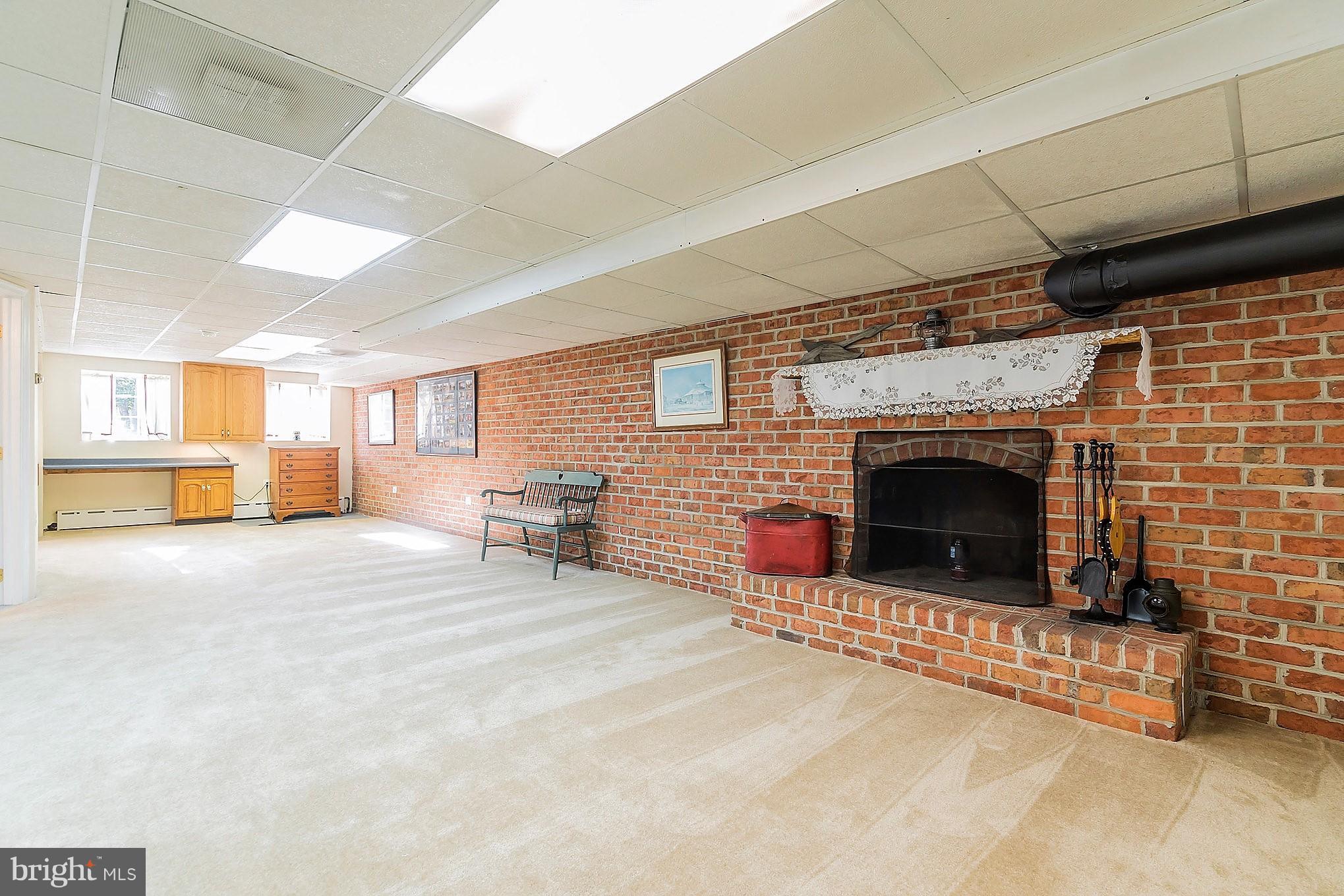 1958 Poplar Ridge Road Pasadena, MD 21122 - Photo 24 of 30 Rec rm with FP & full bath and room for office