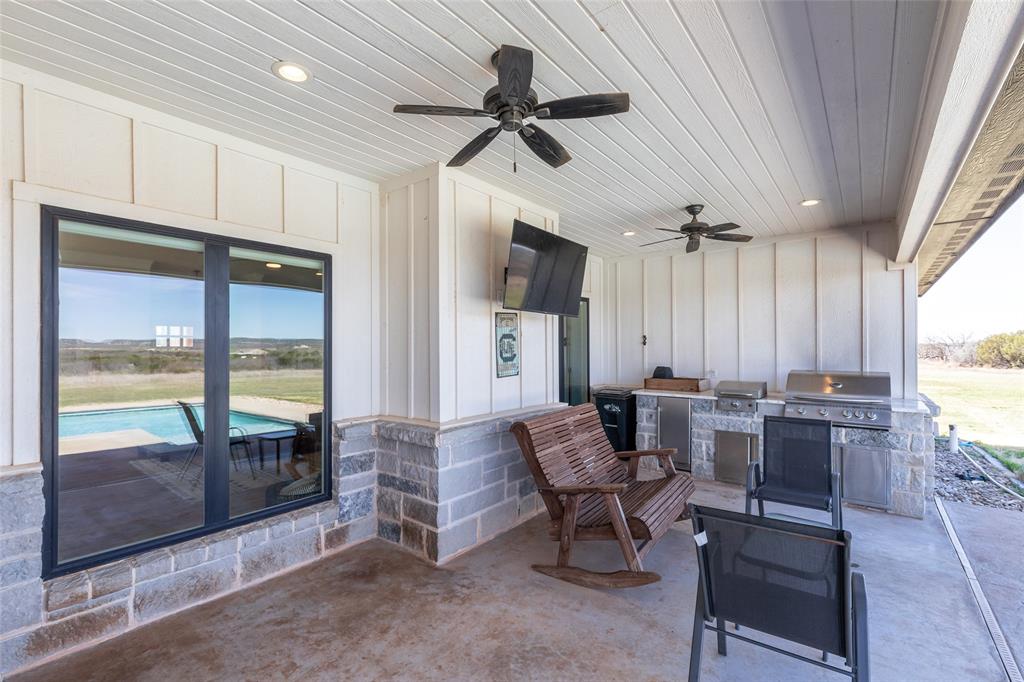 296 Mesquite Ridge Lane Lawn, TX 79530 - Photo 29 of 35 a living room with lots of furniture and a large window