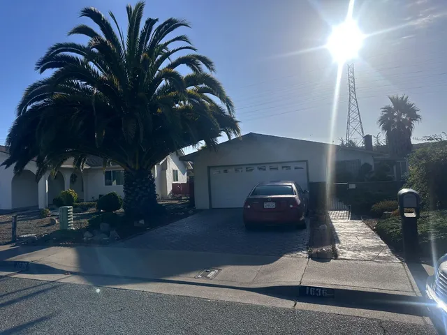 a car parked in front of a house
