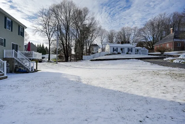 a view of the road with a building in the background
