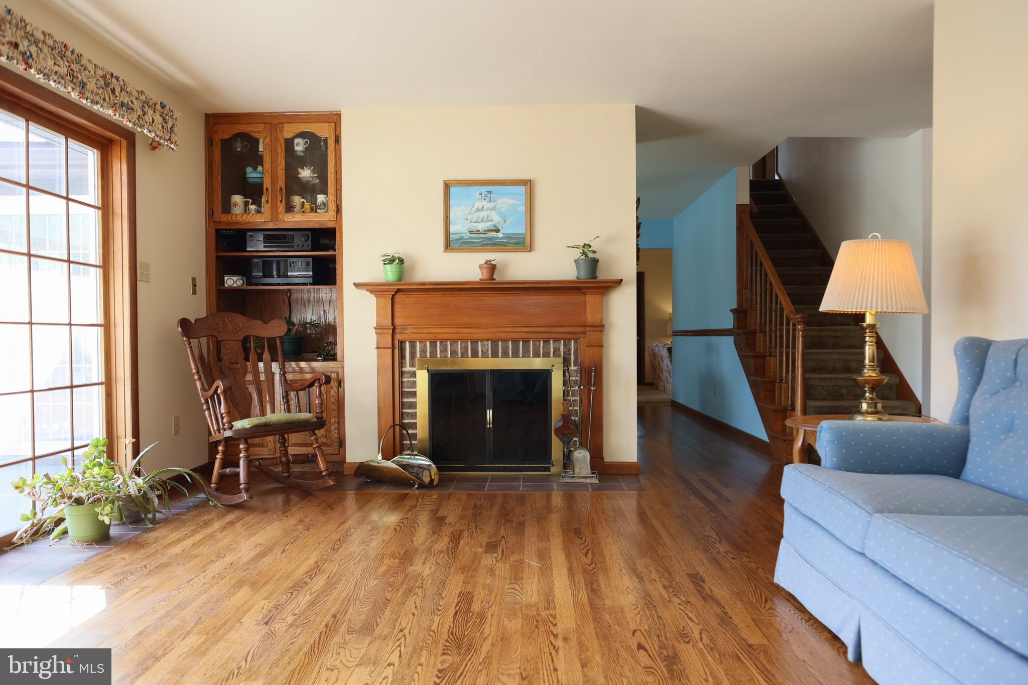 3356 Morris Road Lansdale, PA 19446 - Photo 8 of 31 LR with gleaming HW flr, FP & built-in wall unit
